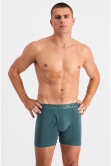 Charlie (He/Him) wears size M and is 183cm tall with 104cm chest and 85cm waist