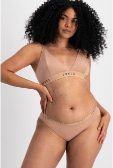 Portia (She/Her) wears size 12 and is 171cm tall with 80cm chest and 64cm waist