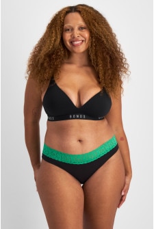 Portia (She/Her) wears size 12 and is 171cm tall with 80cm chest and 64cm waist
